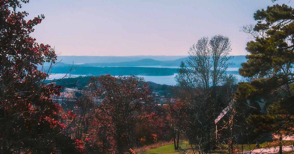 a mountain view of a lake during the fall