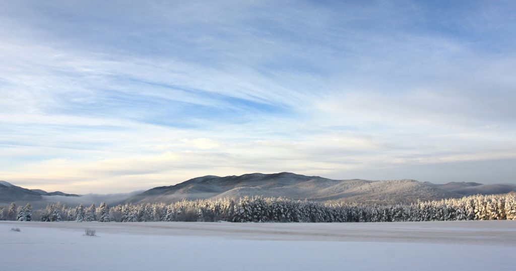 beautiful image of Lake Placid covered in snow