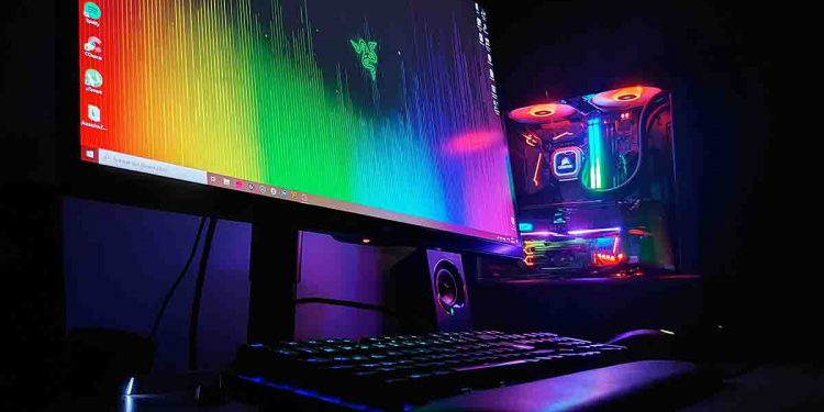 PC monitor with rainbow lights and other gaming implements