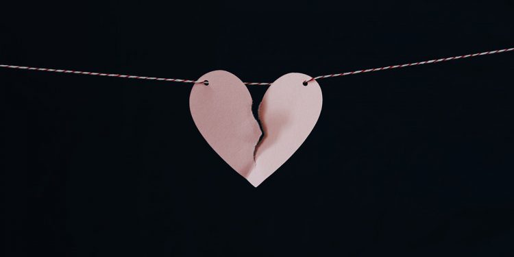 Pink Paper Heart hanging on string