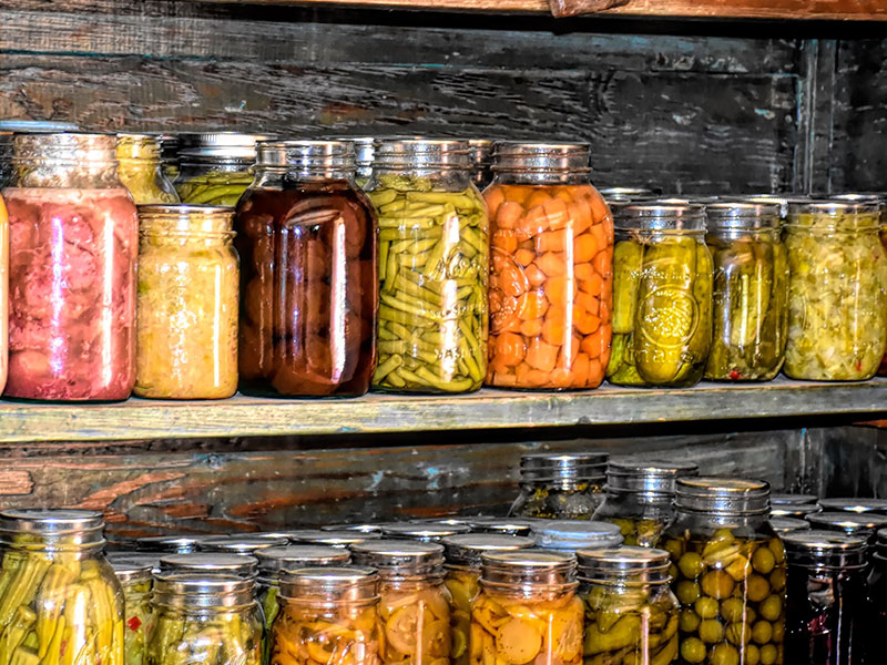 Canned goods on shelf.