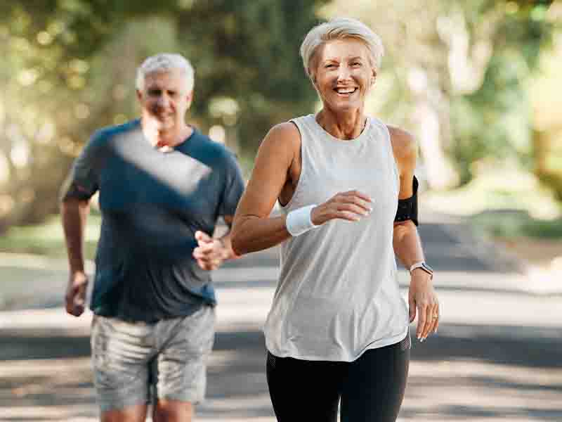 Happy couple running