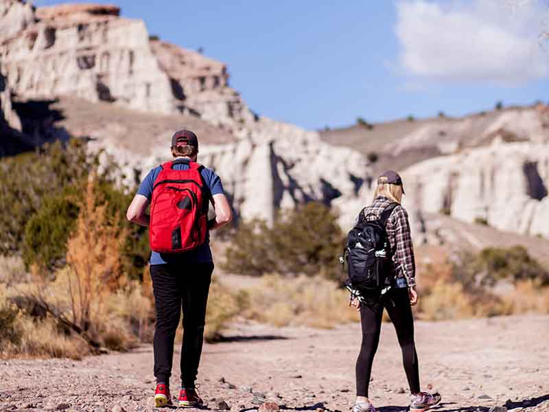 Couple hiking in NM desert