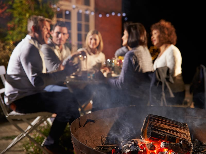 group of people eating outdoors