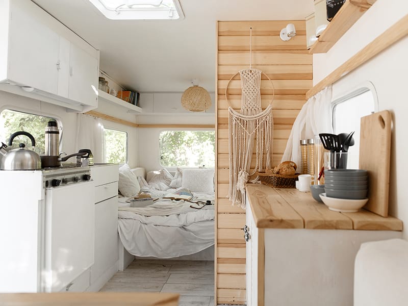 Kitchen with cabinets inside of van