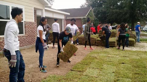 group of volunteers helping with Habitat for Humanity in Houston